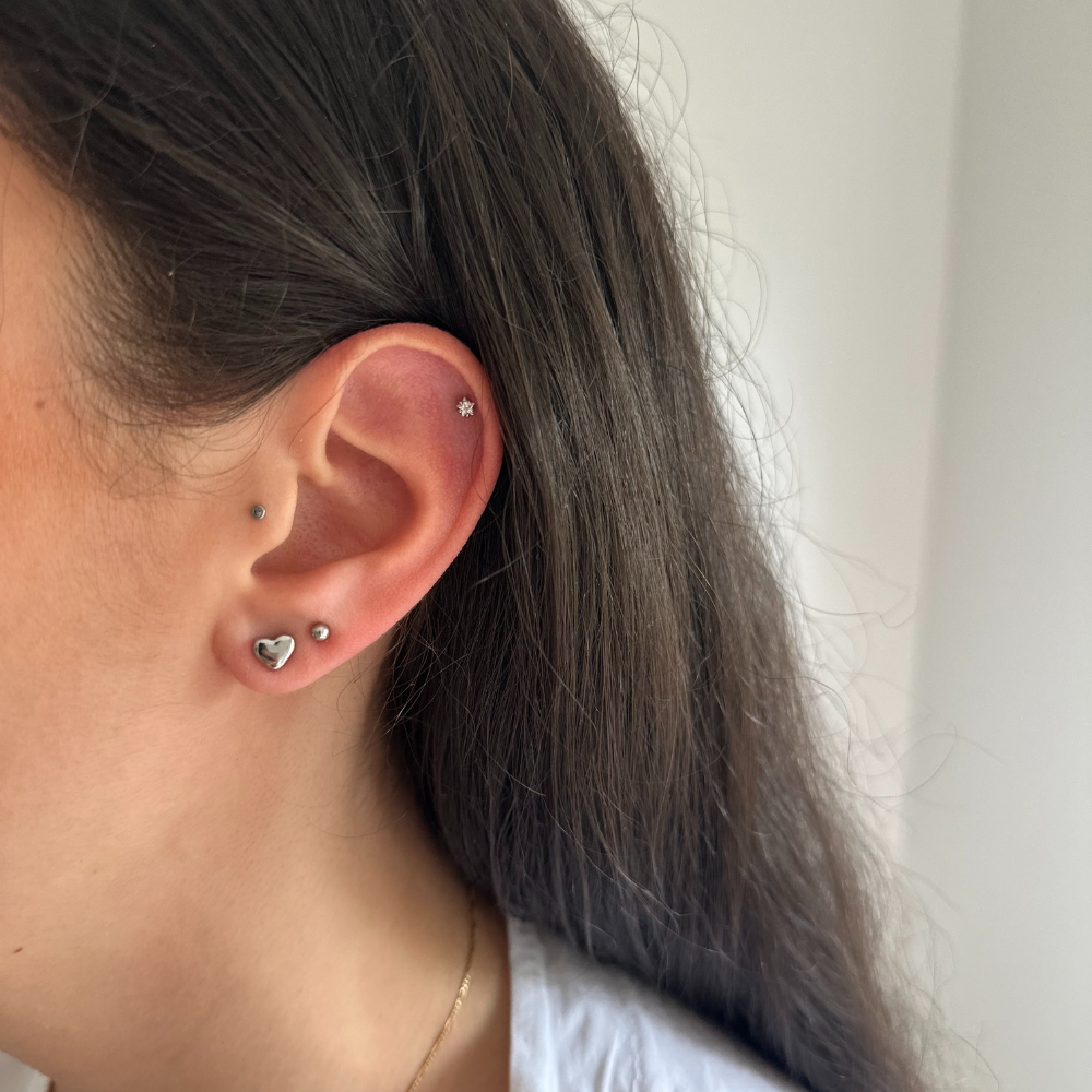 Piercing mono puce coeur