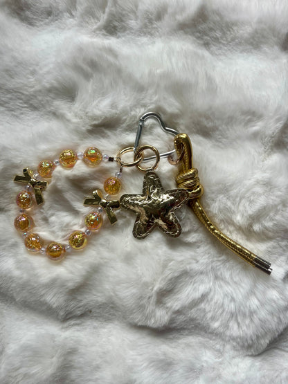 Grigri étoile dorée - STAR