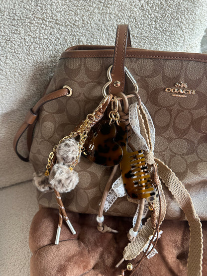 Grigri pompom peigne et miroir léopard