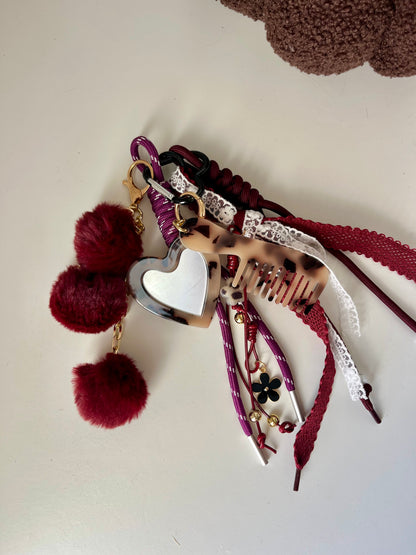 Grigri pompom peigne et miroir bordeaux & léopard