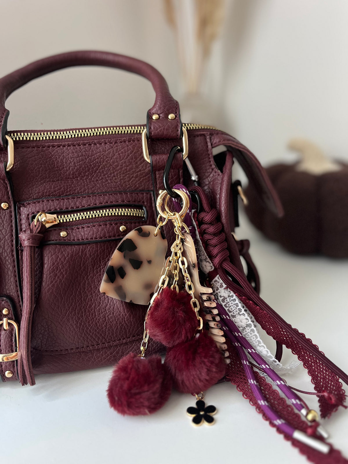 Grigri pompom peigne et miroir bordeaux & léopard