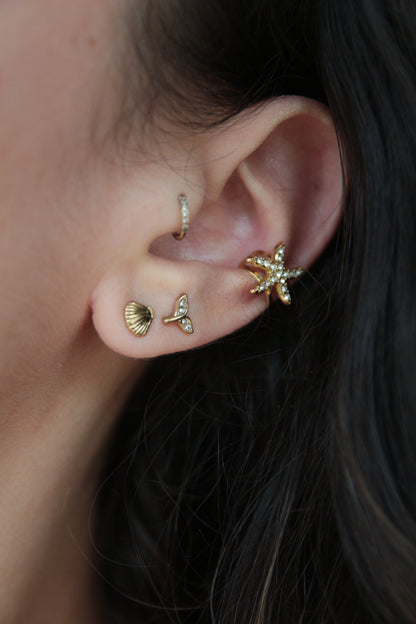 Composition avec faux piercing