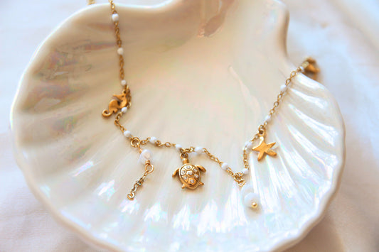 Chaine cheville perles blanches